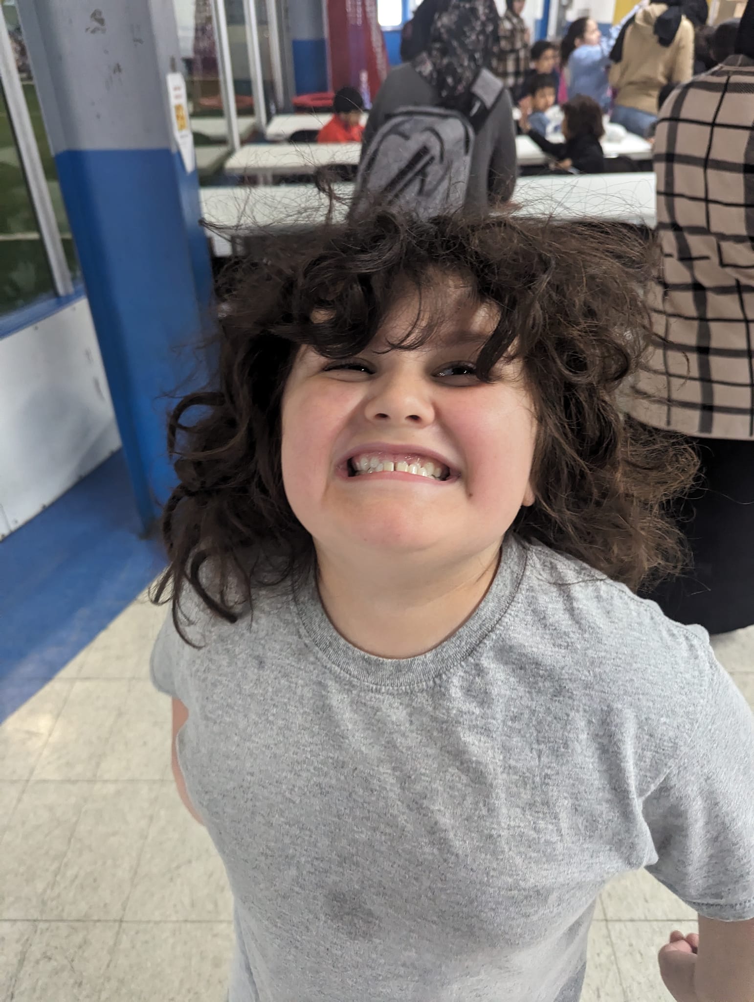 Binyameen smiling on a field trip